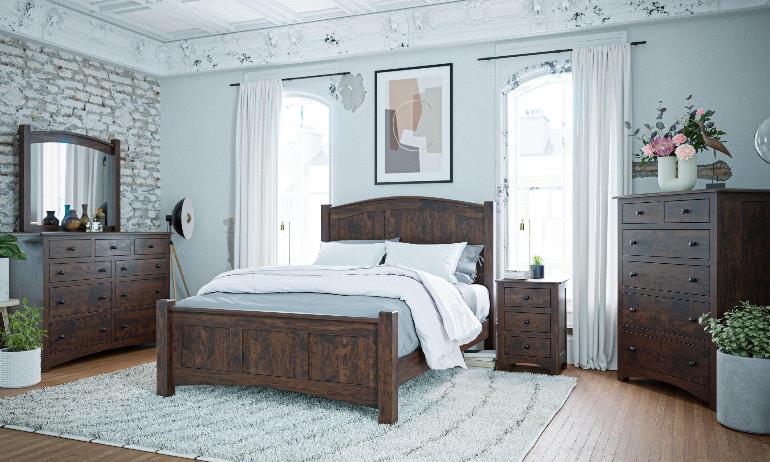 Handcrafted bedroom furniture arranged in a bright, welcoming room.